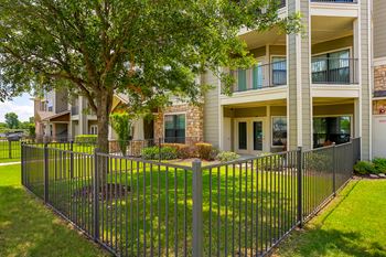 Available fenced-in yard (ask for details)! Note: photo is from a different community and is for illustration purposes only.